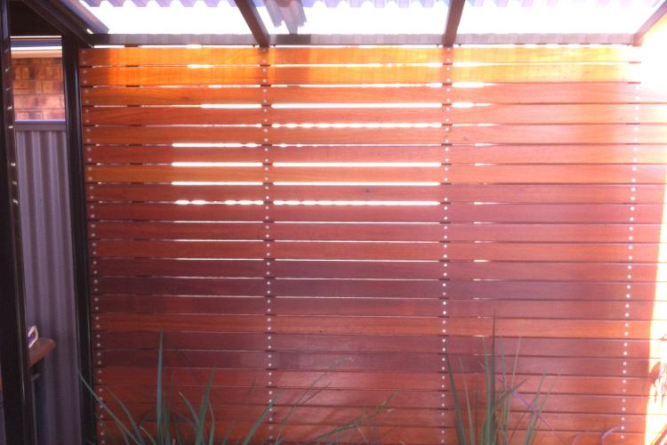 Outdoor wooden slats feature wall