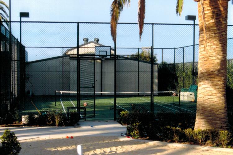Robert repaired the old tennis court, as well as adding new lighting and fencing.
